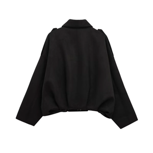 Rear view of black cropped bomber jacket with epaulettes and gathered hem detail
