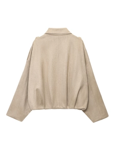Back view of a beige faux suede bomber jacket with drop shoulders and ribbed hem detail