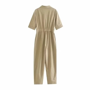 Short sleeve khaki linen jumpsuit with lapel collar and elastic waist on white background
