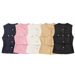 Detail view of tweed vests in five colors with metal buttons and matching belts