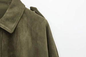 Close-up of army green faux suede jacket showing epaulettes and refined stitching detail