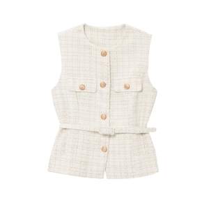 Macro detail of textured tweed fabric and gold buttons on the beige vest with belt