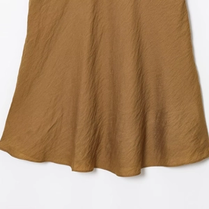 Brown one shoulder asymmetrical A-line dress with textured pleated fabric detail
