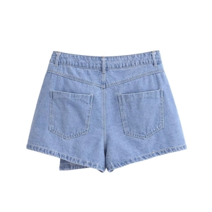 Detail view of high-waist light blue denim shorts featuring symmetric rear pockets