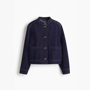 Women's dark blue denim jacket with stand collar and large pockets in a flat lay view