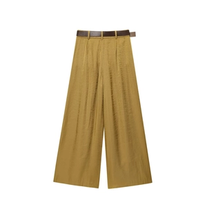 Elegant wide-leg satin trousers in mustard gold with a brown belt on a white background