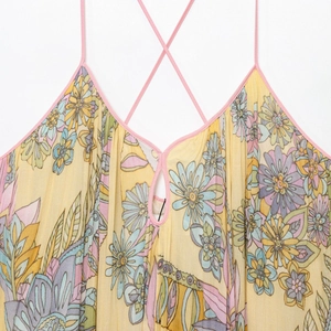 Women's summer loose floral print dress with pink cross straps and V-neck keyhole detail