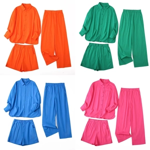 Detailed flat lay of women's 3-piece casual set with shirt, shorts and wide trousers