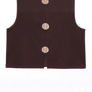 Women's sleeveless vest top in deep brown with three decorative gold shell-shaped buttons