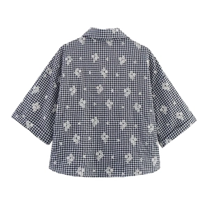 Oversized black and white gingham shirt with white floral embroidery and lapel collar