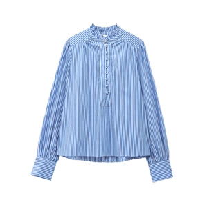Detail of ruffled stand collar and blue striped pattern on cotton long-sleeve blouse