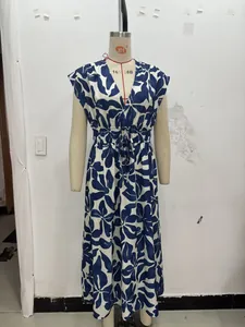 Detail view of V-neck sleeveless maxi dress with blue leaf print and drawstring waist