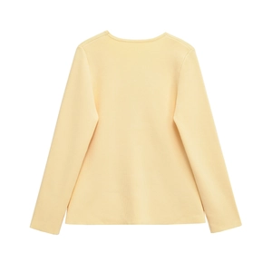 Detail view of the pale yellow knit cardigan back with a clean minimalist silhouette