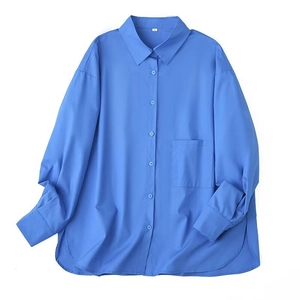 Close-up of royal blue long-sleeve shirt featuring classic collar and square chest pocket