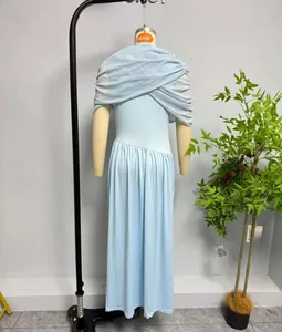 Detail of light blue mesh sleeveless dress showing elegant back draped pleats and long hem