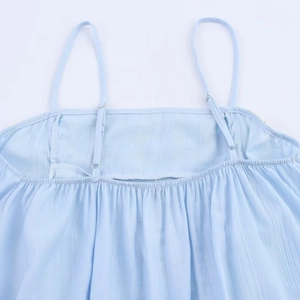 Light blue camisole with adjustable spaghetti straps and delicate pleated chest details