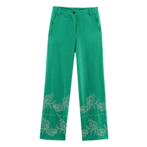 Women's green cotton-linen straight pants with white floral embroidery at the hem