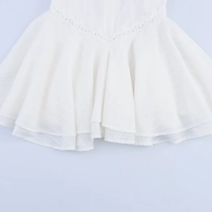Elegant white summer dress with halter neck tie and multi-layered lace trim skirt