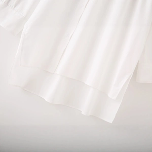White cotton poplin shirt with asymmetric hem and side slit detail for women