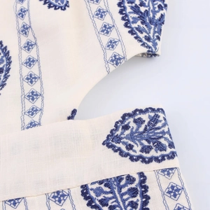 Women's summer midi dress with navy paisley embroidery and hollow out waist detail