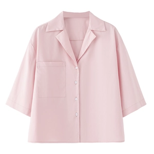 Light pink short sleeve V-neck button shirt with front pocket for minimalist spring style