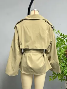 Back view of khaki trench coat featuring classic epaulettes and waist belt detail