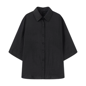 Classic black short-sleeved button-up shirt with lapel collar and loose casual fit