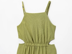 Detail of avocado green summer dress with woven straps and side waist cut-outs