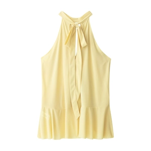 Close-up of pale yellow halter top neck with elegant bow tie and chiffon texture