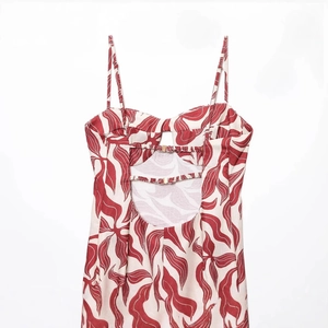 Women's backless midi dress with red leaf print and delicate spaghetti straps