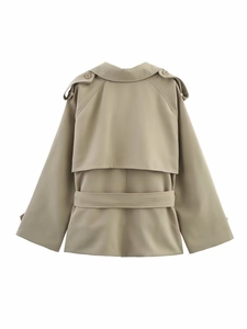 Detailed back view of a khaki trench coat featuring a storm flap and belted waist design