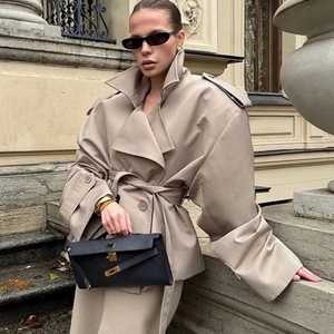 Chic beige oversized trench coat with waist tie and lapel collar for women