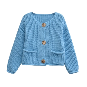 Light blue knit cardigan with round neck, gold buttons and front pockets on white backdrop