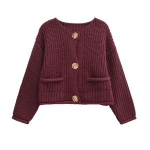 Deep burgundy chunky knit cardigan with round neck and large gold metallic buttons