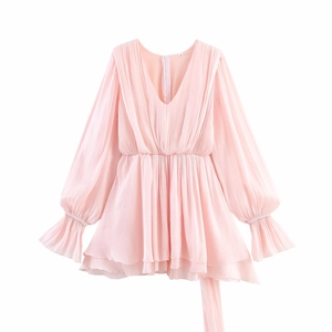 Pink V-neck chiffon dress with layered ruffle details and flowing long sleeves
