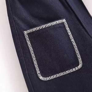 Deep blue denim jeans with white contrast stitching detail and classic patch pocket design