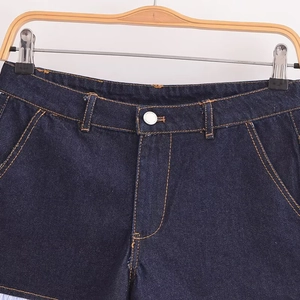 Fashionable dark blue denim shorts with orange contrast stitching and silver button
