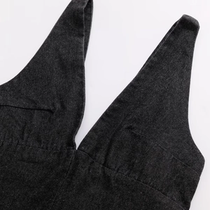 Minimalist V-neck denim dress in dark grey with wide shoulder straps and textured finish