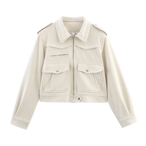Detail of the high-quality stitching and metal zipper on this cream suede jacket