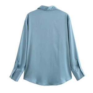 Elegant light blue long sleeve button-up satin shirt for women with back yoke detail