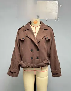 Detail view of dark coffee wool short blazer with double-breasted buttons and belt