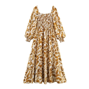 Floral square neck long sleeve dress with smocked bodice and ruffled hemline in white