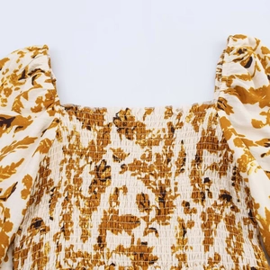 Smocked square neck dress with mustard floral print and puffed sleeves for women