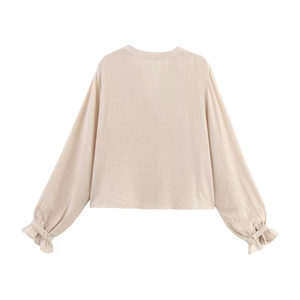 Chic beige long sleeve blouse with textured fabric and lantern ruffle cuffs, back view