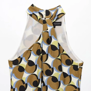 Halter neck sleeveless top with geometric print in brown, black and light blue