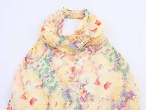 Detailed flat lay of floral halter neck sleeveless top with pastel flower patterns