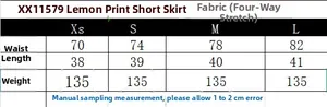 Detailed size guide table for the lemon print mini skirt showing waist and length measurements