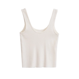 Detailed flat lay of cream ribbed knit camisole showing vertical texture and U-neckline