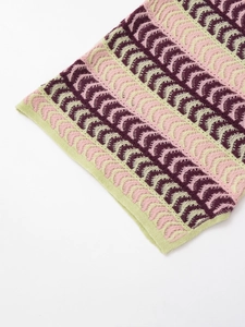 Close-up of wavy crochet knit texture in purple, pink, and green striped pattern