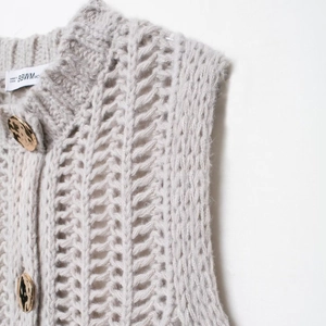 Women's vintage grey chunky knit cardigan with gold buttons and hollow texture